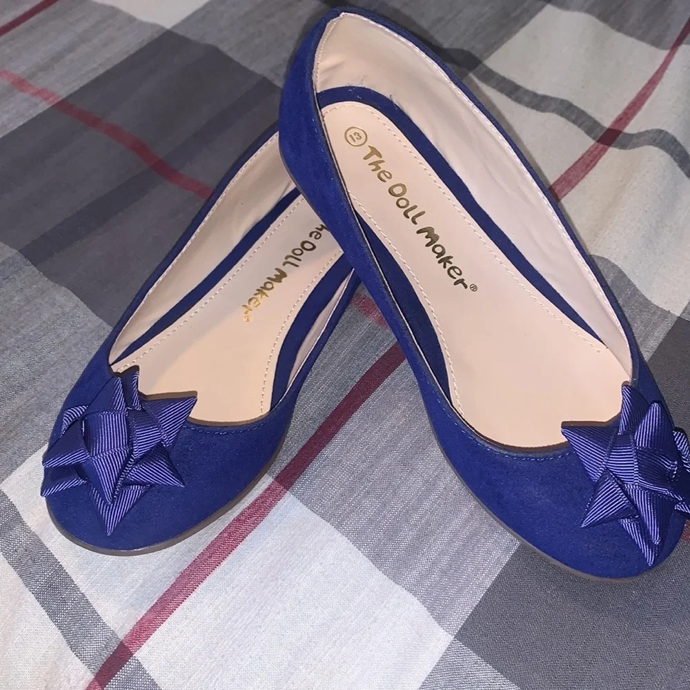 Kids shoes. The doll maker brand.